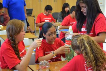 Students building bottle rockets
