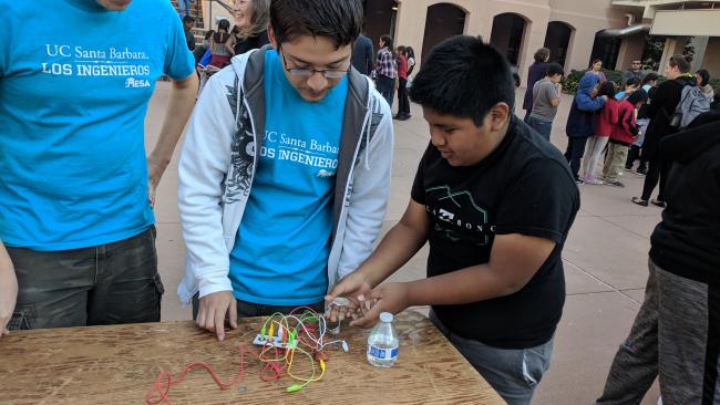 Los Ingenieros students working on electronics project